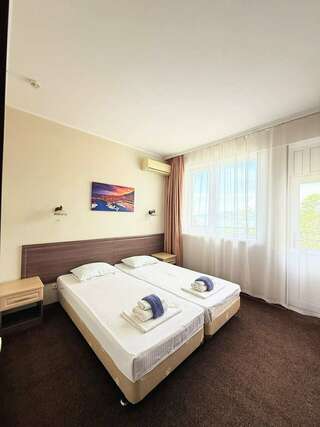 Гостиница Афродита Агой Трехместный номер с видом на море-11